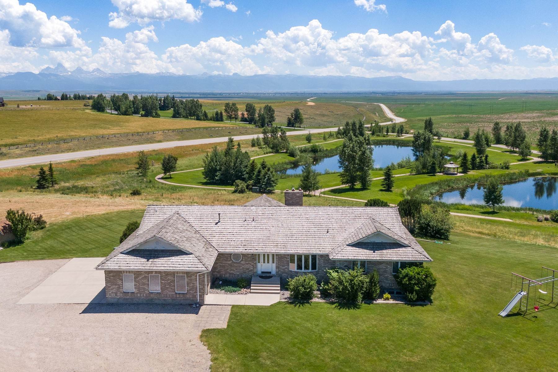 Other Residential Homes for Sale at Stately Brick Home With Teton Views 8867 Rim Village Road Tetonia, Idaho 83452 United States