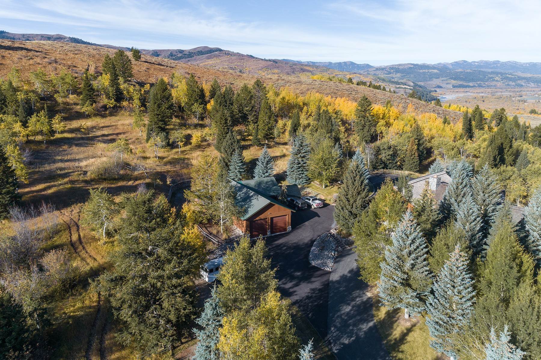 45. Single Family Homes for Sale at Elevated Sanctuary Close to Town 6325 S Squaw Creek Road Jackson, Wyoming 83001 United States