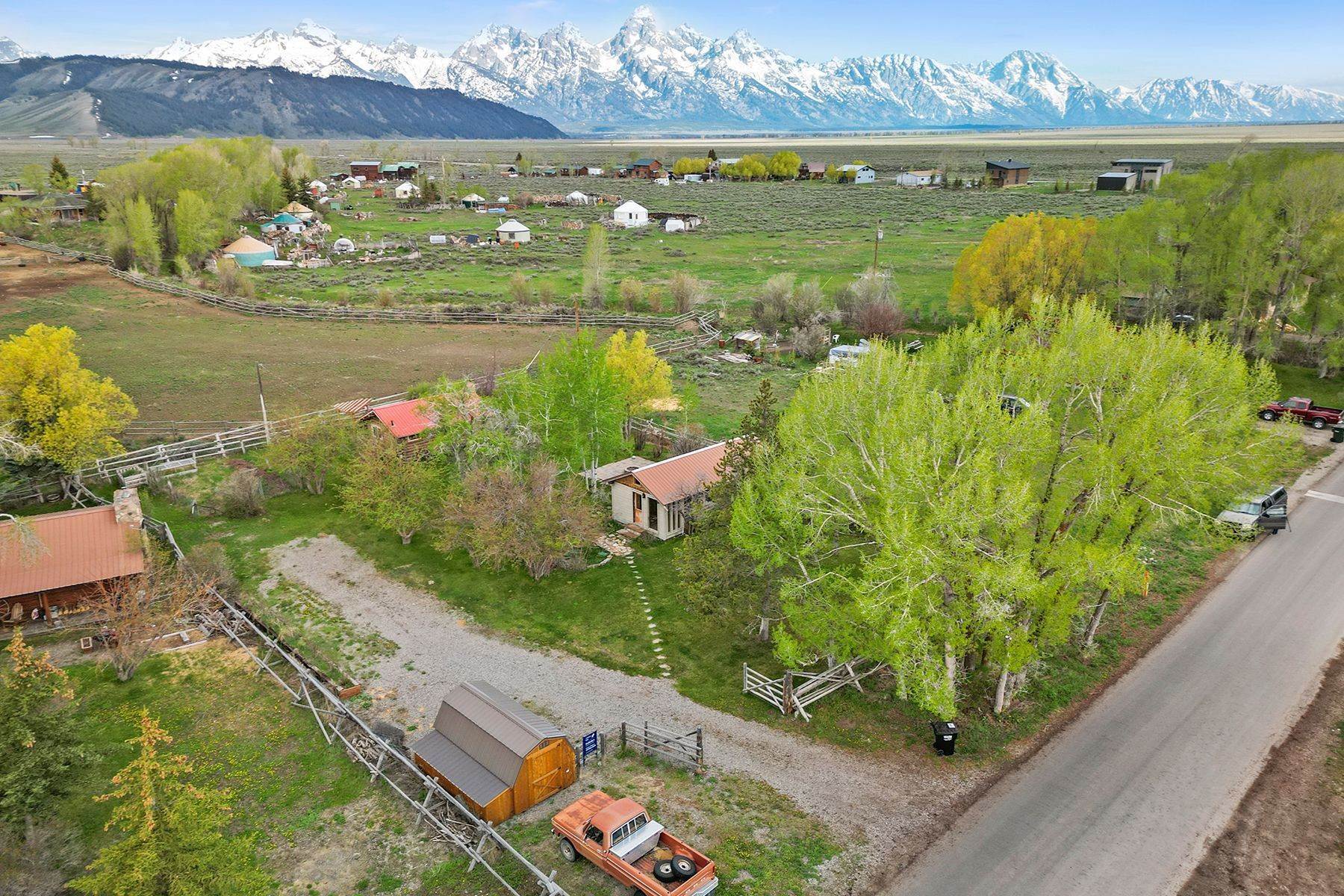 Single Family Homes for Sale at Two Cabins in Kelly with Teton Views 9795 N Main Street Kelly, Wyoming 83011 United States