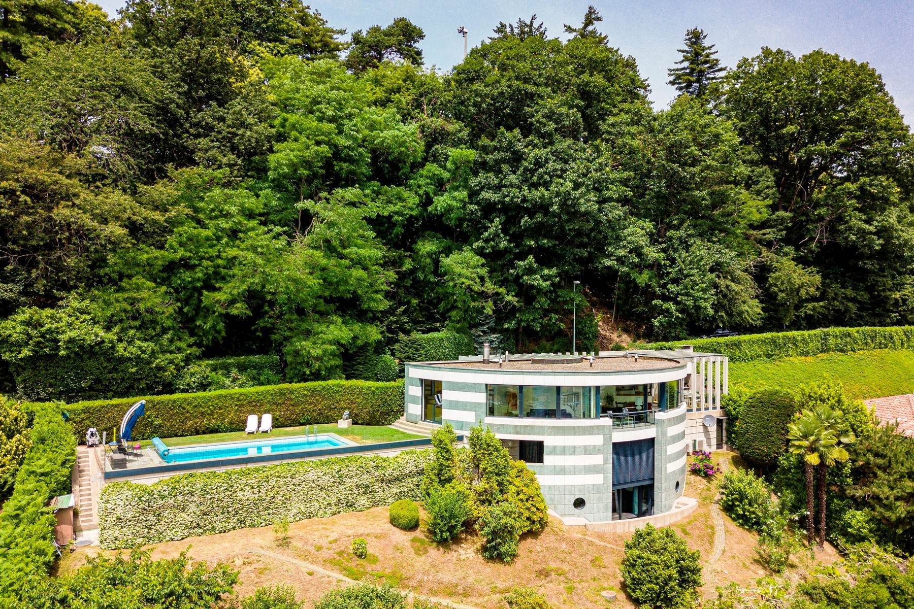 4. Single Family Homes for Sale at Modern villa with privacy & beautiful lake view Lugano Lugano, Ticino 6900 Switzerland