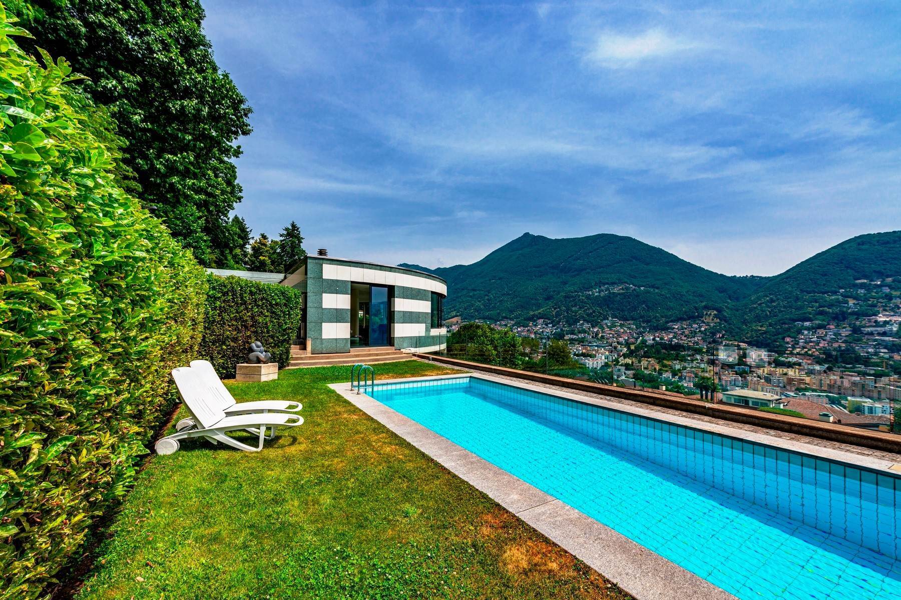 5. Single Family Homes for Sale at Modern villa with privacy & beautiful lake view Lugano Lugano, Ticino 6900 Switzerland