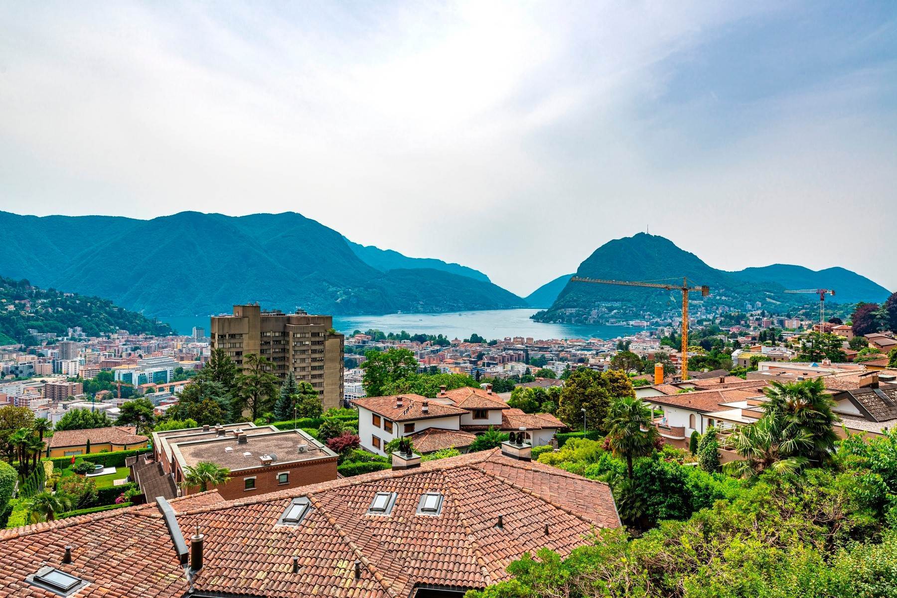 2. Single Family Homes for Sale at Modern villa with privacy & beautiful lake view Lugano Lugano, Ticino 6900 Switzerland